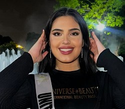 Ana in her universe beauty T-shirts and uk sash at international beauty pageant  in Peru